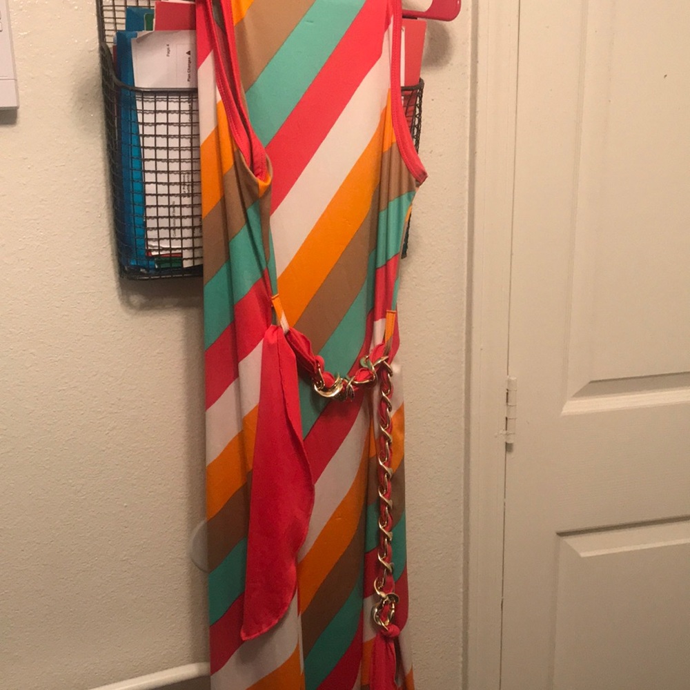 A dress from the brand it’s girls in a size L.